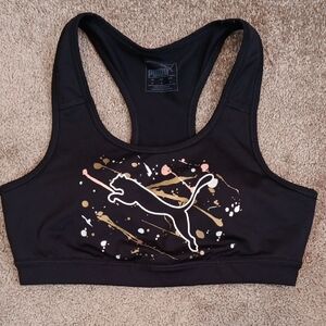 Puma Women's Black Sports Bra with Gold and White Accents